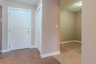 Photo 11: 211 403 Mackenzie Way SW: Airdrie Apartment for sale : MLS®# A2125740