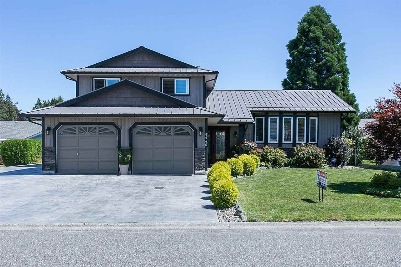 Main Photo: 6940 COACH LAMP Drive in Chilliwack: Sardis West Vedder Rd House for sale in "WELLS LANDING" (Sardis)  : MLS®# R2093207