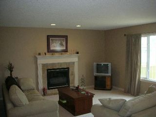 Photo 3: 1212 - 84 Street  SW: House for sale (Summerside) 