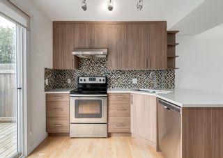 Photo 13: 836 68 Avenue SW in Calgary: Kingsland Semi Detached (Half Duplex) for sale : MLS®# A1250155