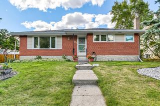 Photo 3: 803 72 Avenue NW in Calgary: Huntington Hills Detached for sale : MLS®# A2001818