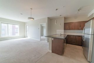 Photo 4: 2305 604 EAST LAKE Boulevard NE: Airdrie Apartment for sale : MLS®# A1238453