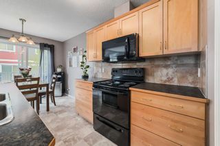 Photo 4: 508 800 Yankee Valley Boulevard: Airdrie Row/Townhouse for sale : MLS®# A2050027