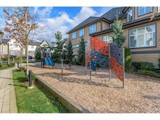 Photo 39: 150 8138 204 Street in Langley: Willoughby Heights Townhouse for sale in "Ashbury and Oak" : MLS®# R2686081