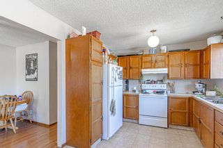 Photo 8: 2403 43 Street SE in Calgary: Forest Lawn Duplex for sale : MLS®# A1082669