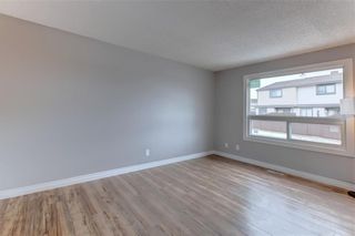 Photo 12: 104 2720 RUNDLESON Road NE in Calgary: Rundle Row/Townhouse for sale : MLS®# C4221687
