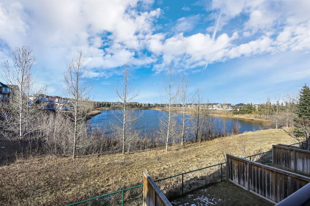 Main Photo: 66 Eversyde Park SW in Calgary: Evergreen Row/Townhouse for sale : MLS®# A1201739