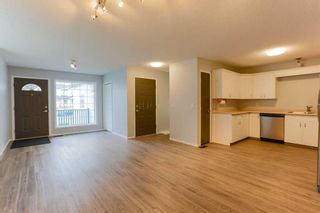Photo 3: 37 Ross Place: Crossfield Semi Detached (Half Duplex) for sale : MLS®# A2079461