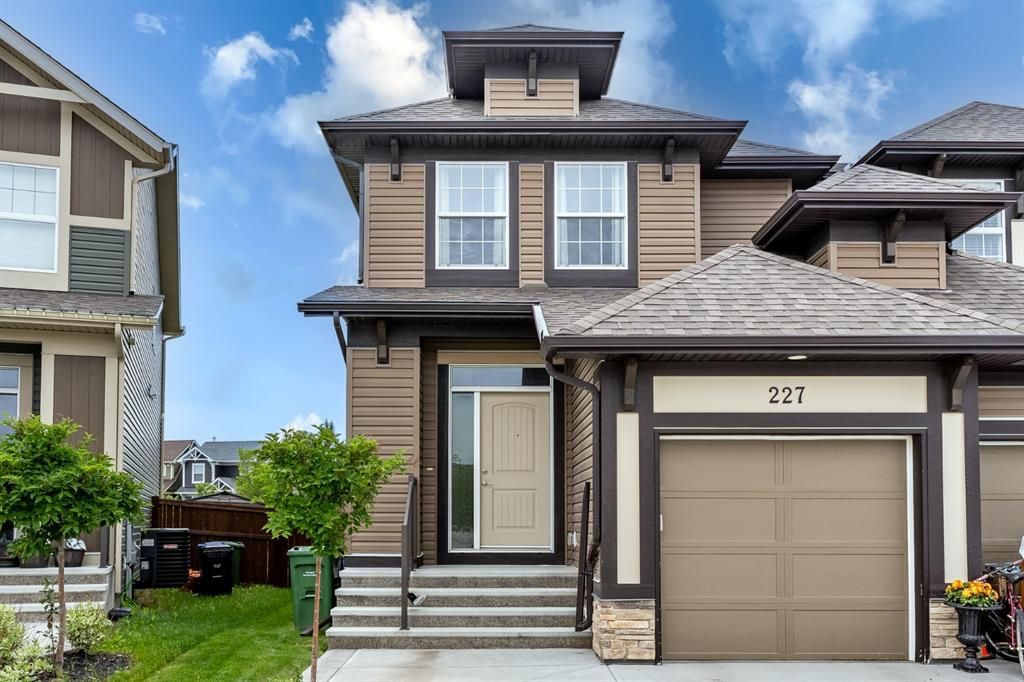 Main Photo: 227 Auburn Meadows Place SE in Calgary: Auburn Bay Semi Detached (Half Duplex) for sale : MLS®# A1238144
