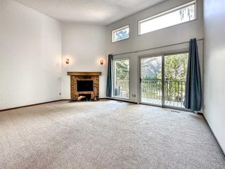 Photo 3: 267 POINT MCKAY Terrace NW in Calgary: Point McKay Row/Townhouse for sale : MLS®# A2055890