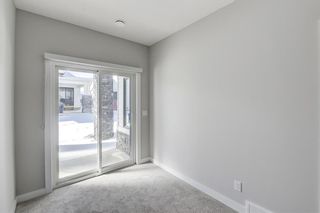 Photo 33: 908 Crestridge Common SW in Calgary: Crestmont Row/Townhouse for sale : MLS®# A2030391