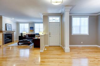Photo 3: 15 10 St Julien Drive SW in Calgary: Garrison Woods Row/Townhouse for sale : MLS®# A2048516
