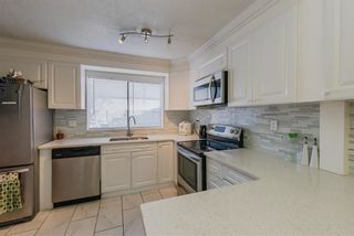 Photo 3: 857 OLD LILLOOET Road in North Vancouver: Lynnmour Townhouse for sale in "LYNNMOUR VILLAGE" : MLS®# R2337354
