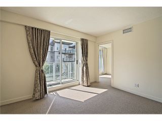 Photo 9: 104 5838 BERTON Avenue in Vancouver: University VW Townhouse for sale in "THE WESBROOK" (Vancouver West)  : MLS®# V1078429