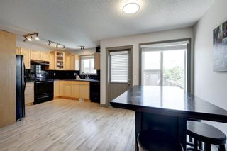 Photo 6: 912 89 Street SW in Calgary: West Springs Row/Townhouse for sale : MLS®# A1241206