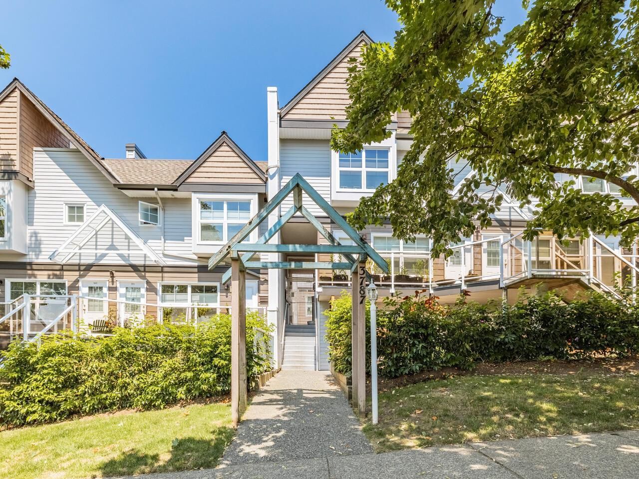 Main Photo: 301 3787 PENDER Street in Burnaby: Willingdon Heights Townhouse for sale (Burnaby North)  : MLS®# R2598443