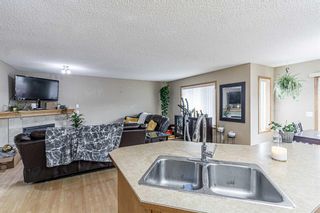 Photo 10: 115 Panamount Heights NW in Calgary: Panorama Hills Detached for sale : MLS®# A2130951