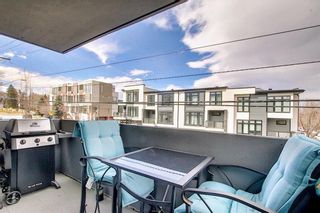 Photo 2: 301 1709 19 Avenue SW in Calgary: Bankview Apartment for sale : MLS®# A1084085