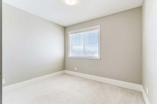 Photo 23: 189 Cougartown Circle SW in Calgary: Cougar Ridge Detached for sale : MLS®# A2107107