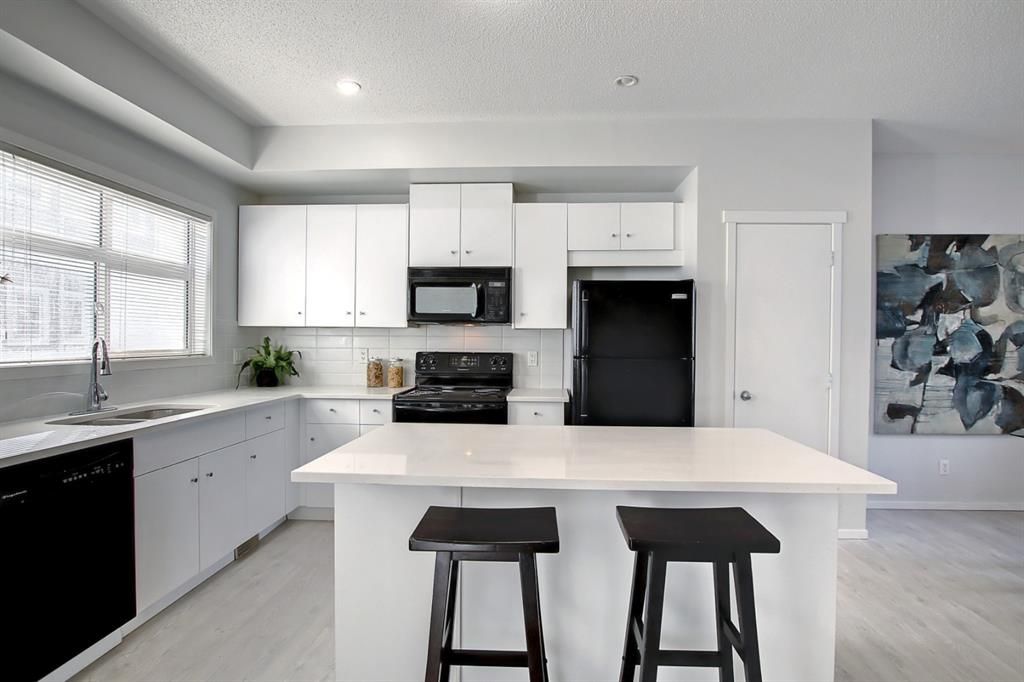 Photo 17: Photos: 39 300 Evanscreek Court NW in Calgary: Evanston Row/Townhouse for sale : MLS®# A1195350