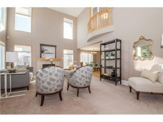 Photo 4: 69 STRATHLEA Place SW in Calgary: Strathcona Park House for sale : MLS®# C4101174