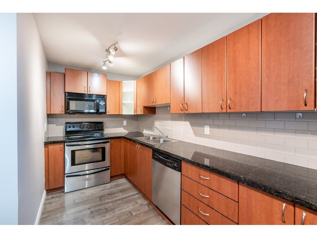 Photo 6: Photos: 105 3063 IMMEL Street in Abbotsford: Central Abbotsford Condo for sale in "Clayburn Village" : MLS®# R2524410