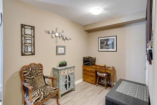 Photo 9: 1204 92 Crystal Shores Road: Okotoks Apartment for sale : MLS®# A1083634