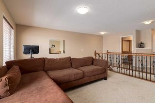 Photo 19: 200 Cougartown Close SW in Calgary: Cougar Ridge Detached for sale : MLS®# A2124049