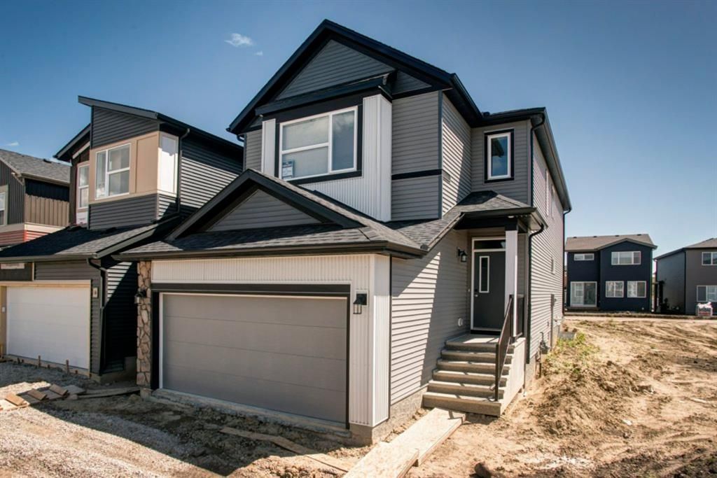 Main Photo: 38 Wolf Hollow Way SE in Calgary: C-281 Detached for sale : MLS®# A1013353