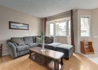 Photo 3: 2664 Dovely Court SE in Calgary: Dover Row/Townhouse for sale : MLS®# A1252028