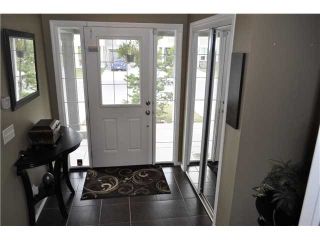 Photo 2: 64 WINDSTONE Green SW: Airdrie Townhouse for sale : MLS®# C3629867