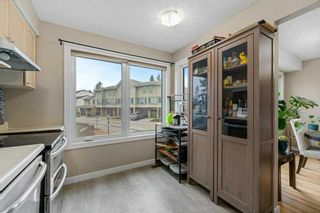 Photo 4: 10 Coachway Gardens SW in Calgary: Coach Hill Row/Townhouse for sale : MLS®# A2126800