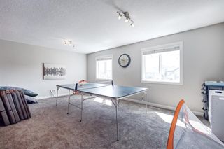 Photo 13: 44 Elmont Mews SW in Calgary: Springbank Hill Detached for sale : MLS®# A1241182