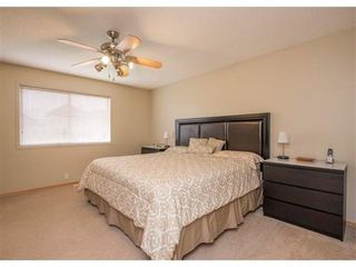Photo 5: 1041 BRIDLEMEADOWS Manor SW in Calgary: Bridlewood Residential for sale ()  : MLS®# C4027220