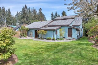 Family home with 2 attached suites on 0.48 acres in a popular residential area on the east side of Quadra Island!