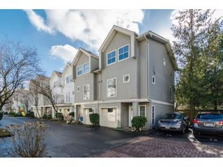 Photo 1: 401 14188 103A Avenue in Surrey: Whalley Townhouse for sale in "Ashbury Lane" (North Surrey)  : MLS®# R2140903