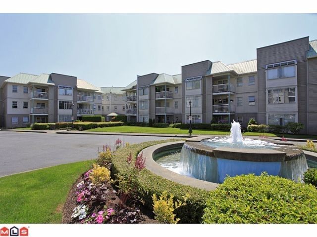 Main Photo: 311 9763 140TH Street in Surrey: Whalley Condo for sale (North Surrey)  : MLS®# F1217814