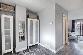 Photo 3: 104 7172 Coach Hill Road SW in Calgary: Coach Hill Row/Townhouse for sale : MLS®# A1097069