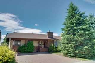 Photo 1: 7719 67 Avenue NW in Calgary: Silver Springs Detached for sale : MLS®# A1013847