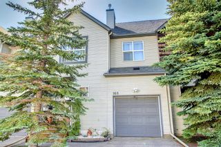 Photo 1: 168 Bridlewood View SW in Calgary: Bridlewood Row/Townhouse for sale : MLS®# A1244858