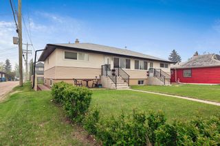 Photo 2: 2003 5 Avenue NW in Calgary: West Hillhurst Full Duplex for sale : MLS®# A2051062