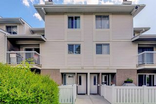 Photo 1: 56 3015 51 Street SW in Calgary: Glenbrook Row/Townhouse for sale : MLS®# A2071225
