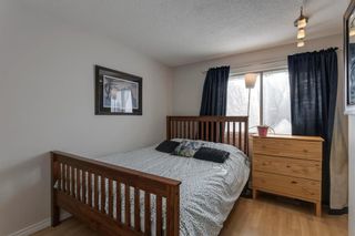 Photo 23: 322 Woodvale Crescent SW in Calgary: Woodlands Row/Townhouse for sale : MLS®# A2015272