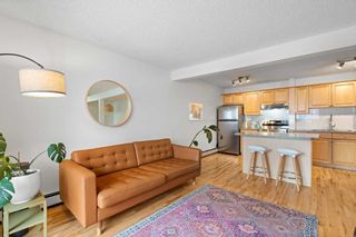 Main Photo: 202 222 5 Avenue NE in Calgary: Crescent Heights Apartment for sale : MLS®# A2123806