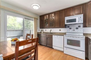 Photo 10: 109 4001 MT SEYMOUR Parkway in North Vancouver: Roche Point Townhouse for sale in "The Maples" : MLS®# R2204732