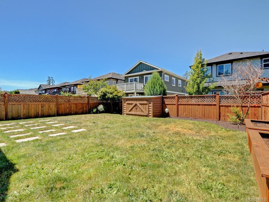 Fully fenced level back yard, larger than typical in Happy Valley in this price range!