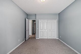 Photo 32: 8 220 Bow Ridge Court: Cochrane Semi Detached (Half Duplex) for sale : MLS®# A2026724