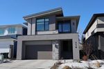 Main Photo: 114 Rock Lake Heights NW in Calgary: Rocky Ridge Detached for sale : MLS®# A2099519