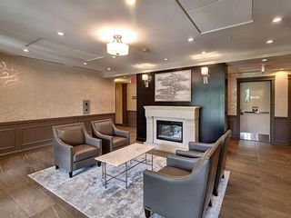 Photo 3: 202 39 Quarry Gate SE in Calgary: Douglasdale/Glen Apartment for sale : MLS®# A1175980