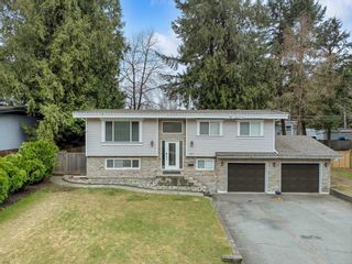 Photo 1: 4019 196A Street in Langley: Brookswood Langley House for sale : MLS®# R2871356